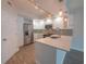 Modern kitchen featuring white cabinets, quartz countertops, and stainless steel appliances at 322 E Central Blvd # 1412, Orlando, FL 32801