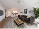 Inviting living room featuring stylish furniture, decor, and a modern open layout at 322 E Central Blvd # 1412, Orlando, FL 32801