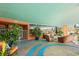 Inviting patio with comfortable seating, vibrant plants, and ample space for outdoor entertaining and relaxation at 322 E Central Blvd # 1412, Orlando, FL 32801