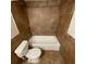 Bathroom showcases a tiled shower-tub with a toilet at 415 Wymore Rd # 101, Altamonte Springs, FL 32714