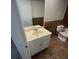 Bathroom features a vanity with sink and toilet at 415 Wymore Rd # 101, Altamonte Springs, FL 32714