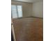 Versatile living area featuring carpeted flooring, and access to the sliding glass door leading outside at 415 Wymore Rd # 101, Altamonte Springs, FL 32714