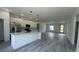 Modern kitchen boasts a spacious island, stainless steel appliances, and sleek pendant lighting at 482 Marion Oaks Mnr, Ocala, FL 34473