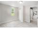 Inviting bedroom with a large window, closet, and marble floors at 4925 Catfish Rd, Lake Wales, FL 33898