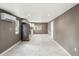Open concept kitchen with stainless steel appliances, granite counters, and white cabinets at 4925 Catfish Rd, Lake Wales, FL 33898