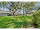 Lush backyard with mature trees offering lots of shade for your outdoor enjoyment at 616 Woodridge Dr, Casselberry, FL 32730