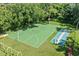 A vibrant outdoor basketball court and shuffleboard create a lively space for recreation and neighborhood activities at 616 Woodridge Dr, Casselberry, FL 32730