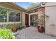 Cozy outdoor patio with plants and seating, perfect for relaxing or entertaining guests at 616 Woodridge Dr, Casselberry, FL 32730