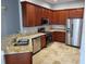 Well-equipped kitchen with stainless steel appliances and granite countertops at 6416 S Goldenrod Rd # 8A, Orlando, FL 32822
