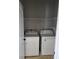 A compact laundry area with a washing machine and dryer at 6416 S Goldenrod Rd # 8A, Orlando, FL 32822