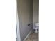 Small powder room with modern toilet and neutral tones at 6416 S Goldenrod Rd # 8A, Orlando, FL 32822