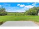 Spacious green backyard with bright sunlight and conservation view at 6720 Midland Drive, St Cloud, FL 34771