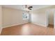 Bedroom features new floors, neutral paint, and natural light at 6720 Midland Drive, St Cloud, FL 34771