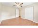 Cozy bedroom with ceiling fan, closet, and neutral paint at 6720 Midland Drive, St Cloud, FL 34771