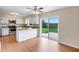 Modern kitchen with white cabinetry, stainless steel appliances, and breakfast bar at 6720 Midland Drive, St Cloud, FL 34771