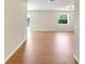 Spacious living room with wood flooring and ample natural light at 6720 Midland Drive, St Cloud, FL 34771