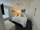 Cozy bedroom with a comfortable bed, soft lighting, and a calming atmosphere at 862 Bowden Rd, The Villages, FL 32163