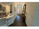 Inviting entryway featuring hardwood floors, stylish decor, and plenty of natural light at 862 Bowden Rd, The Villages, FL 32163