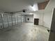 Spacious garage with ample storage and organization potential at 862 Bowden Rd, The Villages, FL 32163