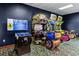 Fun game room with arcade games for hours of Gathering entertainment at 8977 Majesty Palm Rd, Kissimmee, FL 34747