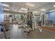 Well equipped community gym and fitness center with weights and machines at 8977 Majesty Palm Rd, Kissimmee, FL 34747