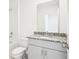 Bright bathroom featuring a granite vanity, updated fixtures and a shower-tub combo at 903 Donahue Pass, Lake Hamilton, FL 33851