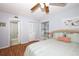 Cozy bedroom offers ensuite bathroom access, closet and a bright window at 954 Courtyard Ln # 52, Orlando, FL 32825