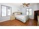 Inviting bedroom features natural light, neutral tones, and wood-look flooring at 954 Courtyard Ln # 52, Orlando, FL 32825