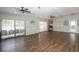 Spacious community clubhouse with hardwood floors, ceiling fans, and bright natural light at 954 Courtyard Ln # 52, Orlando, FL 32825