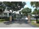 Gated entrance to the Orlando Condominiums property at 954 Courtyard Ln # 52, Orlando, FL 32825