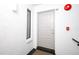 Condo unit entryway showing a front door with a light gray finish and unit number 52 at 954 Courtyard Ln # 52, Orlando, FL 32825