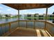 View from the gazebo on the lake highlighting waterfront views and community buildings at 954 Courtyard Ln # 52, Orlando, FL 32825