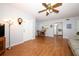 Open floor plan living room shows view to the adjacent dining area and eat in kitchen at 954 Courtyard Ln # 52, Orlando, FL 32825