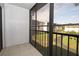 Outdoor patio with views of green space and neighboring buildings at 954 Courtyard Ln # 52, Orlando, FL 32825