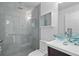 Modern bathroom with a glass shower and vessel sink at 9821 Caroline Park Dr, Orlando, FL 32832