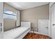 Simple bedroom with a twin bed and neutral color palette at 9821 Caroline Park Dr, Orlando, FL 32832