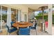 Outdoor dining area with a grill and heat lamp at 9821 Caroline Park Dr, Orlando, FL 32832