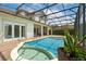 Backyard pool and patio, perfect for relaxing at 9821 Caroline Park Dr, Orlando, FL 32832