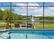 Backyard pool with a lake view at 9821 Caroline Park Dr, Orlando, FL 32832