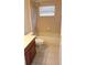 This bathroom features a shower-tub combo with tile surround, toilet, and vanity at 13157 Paloma Dr, Orlando, FL 32837