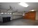 Spacious garage with storage cabinets and plenty of room for parking at 13157 Paloma Dr, Orlando, FL 32837