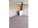 Upstairs loft with neutral carpet flooring and ceiling fan at 13157 Paloma Dr, Orlando, FL 32837