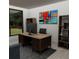 Functional home office with a large desk, bookshelves, and a bright window at Tbd Sw 177Th St, Ocala, FL 34473