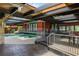 Inviting outdoor pool area with a covered patio and modern design at 10300 Pocket Ln, Orlando, FL 32836