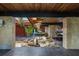 Indoor rock garden with water feature and exotic plants at 10300 Pocket Ln, Orlando, FL 32836