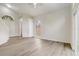 Bright living room features new flooring, vaulted ceiling, and modern windows at 10599 Satinwood Cir, Orlando, FL 32825