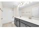 This bathroom offers double sinks, modern fixtures, and a shower-tub combination at 11139 Cyrilla Woods Dr, Orlando, FL 32832