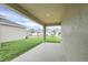 This covered patio offers an outdoor living space at 11139 Cyrilla Woods Dr, Orlando, FL 32832
