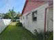 Home exterior featuring a fenced yard and stucco walls at 1152 Ring St, Deltona, FL 32725
