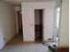 Hallway features tile flooring, neutral walls, with access to multiple rooms, allowing for seamless transitions throughout the home at 1152 Ring St, Deltona, FL 32725
